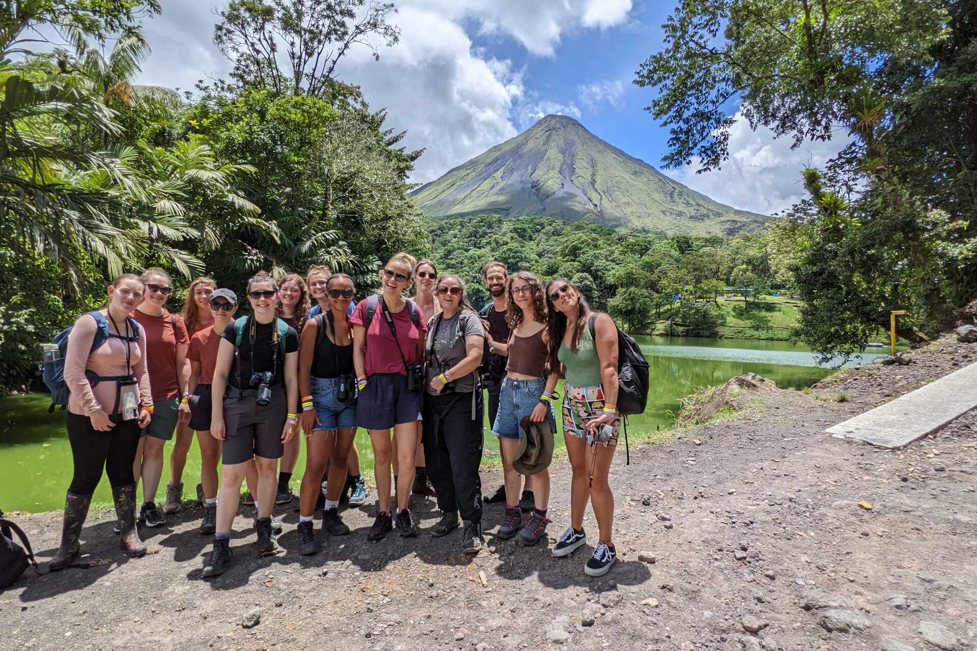 Group photo in front of a Costa Rican volcano