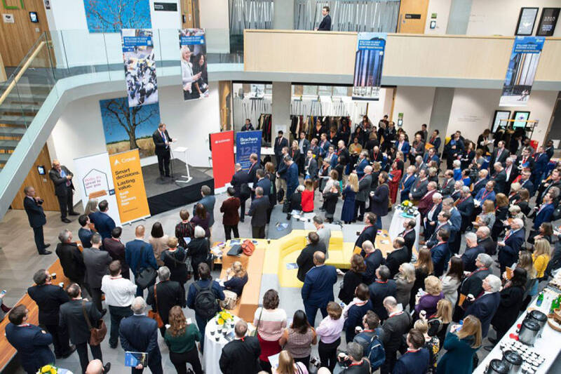 Aerial view looking down on the Sibson Atrium, during the Kent and Medway Business Summit. Delegates listening to speaker.