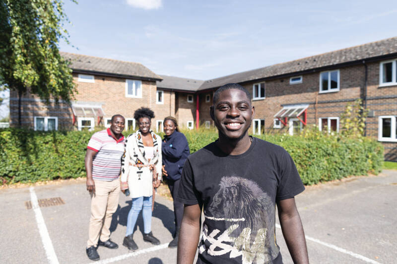 Student being dropped off by parents at tier accommodation.