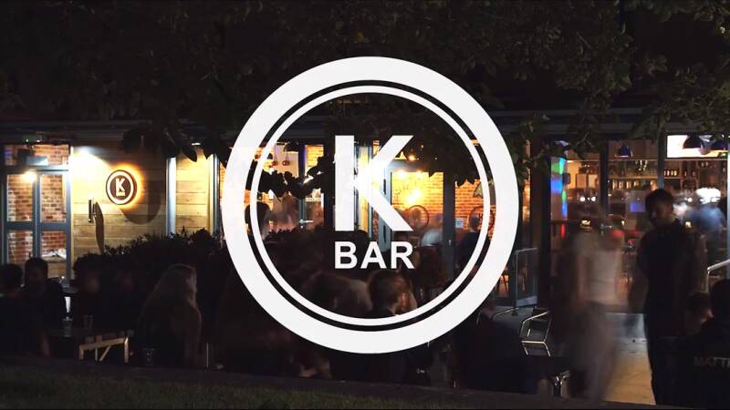 Still title frame of the bar at night from K Bar video