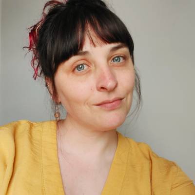 Alice Heggie, white woman, early 30s, dark brown hair