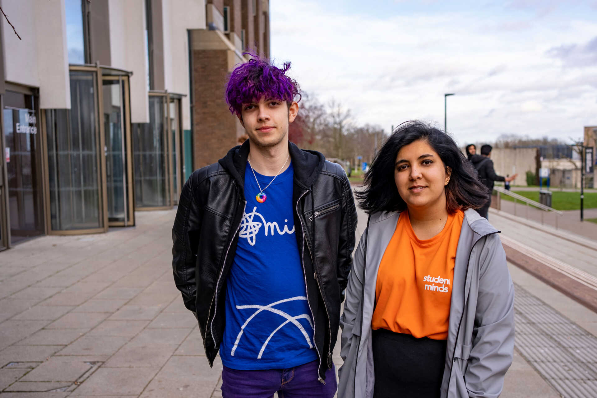 Shivali and Tommy from Kent Mind smiling at each other