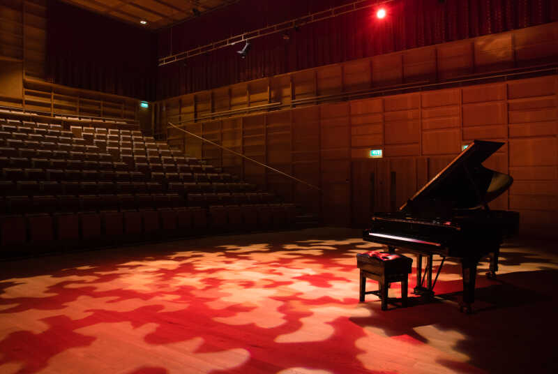 A grand piano in a concert-hall