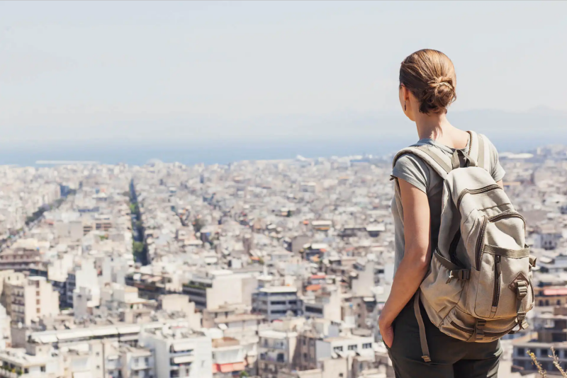 A person overlooking a city landscape