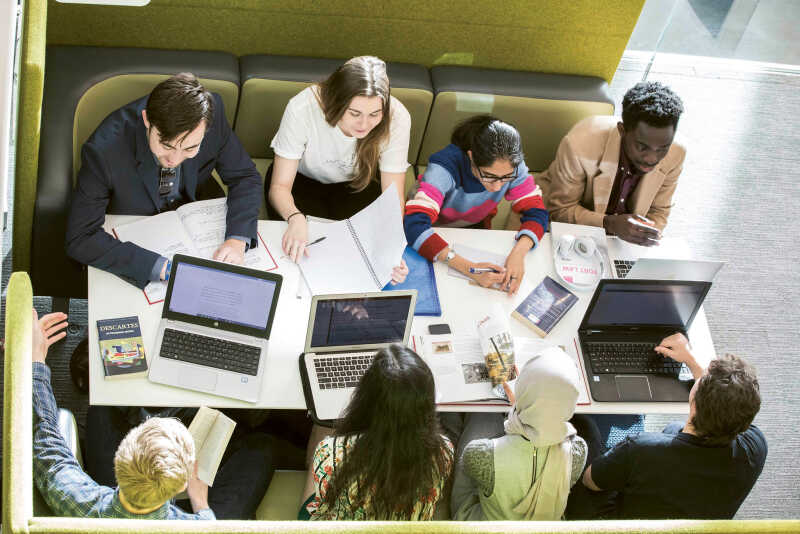 Students working together in the library