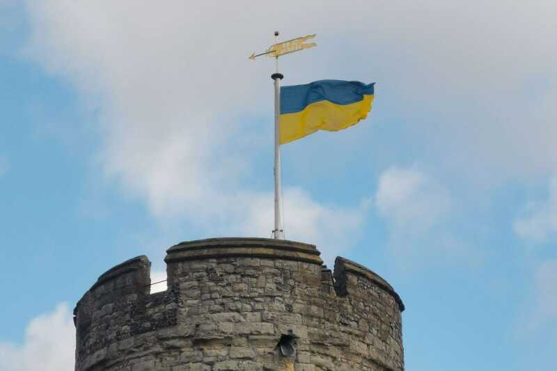 photo of Ukraine flag on top of turret