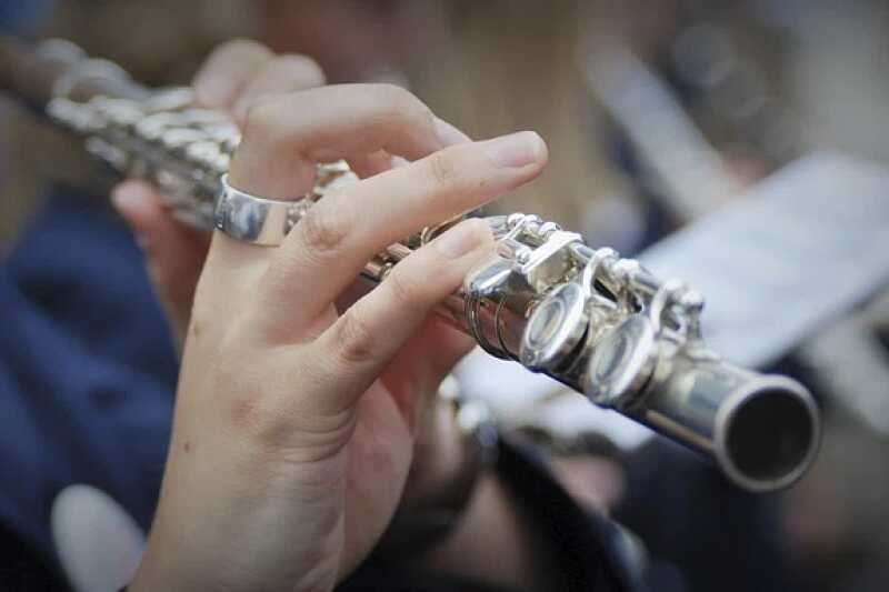 Close up photo of flute being played