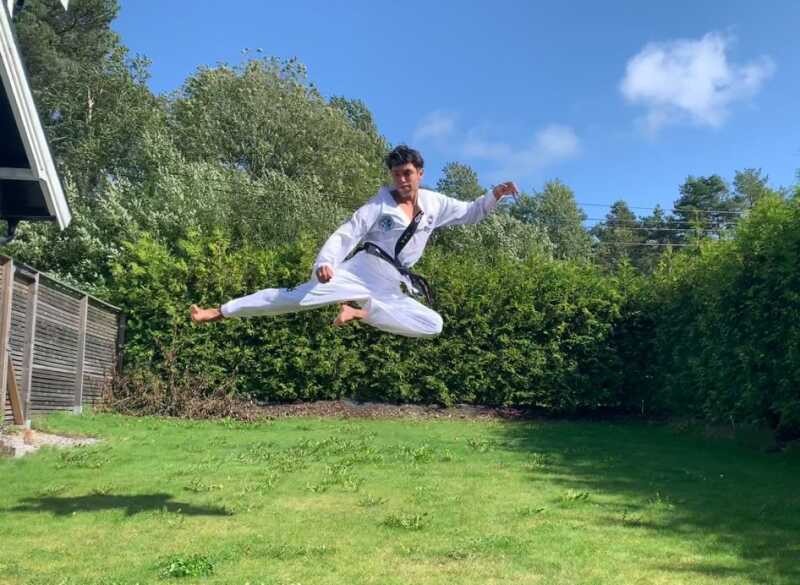 Aaron doing a flying side kick