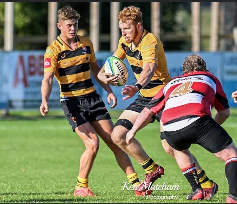 Harry Andrews playing rugby