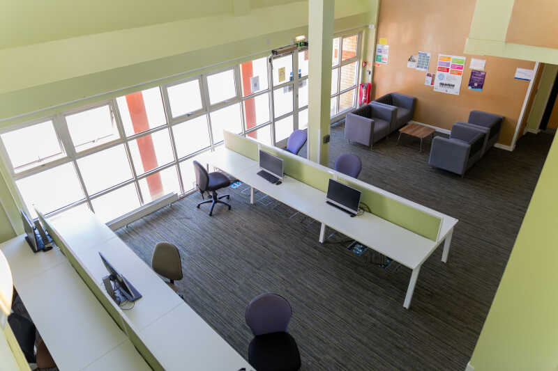 Students work in a shared study space in Tyler Court A