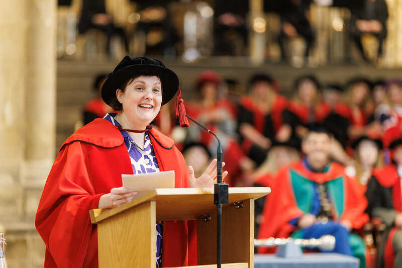 Josie Long giving a speech to students