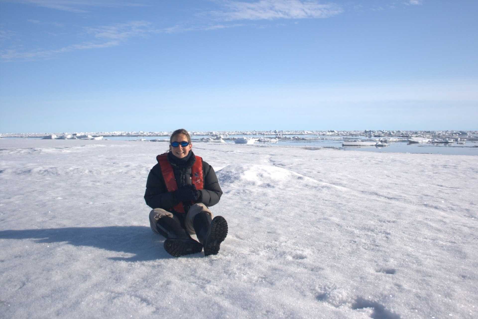 Zoe Davies sitting down in the arctic