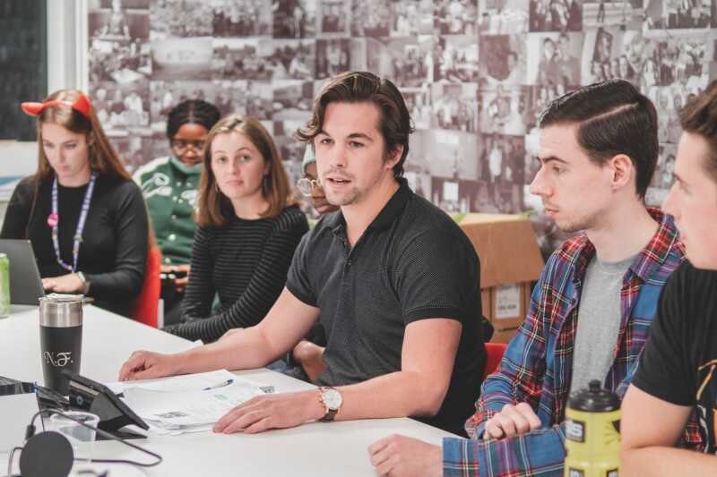 student talking in meeting