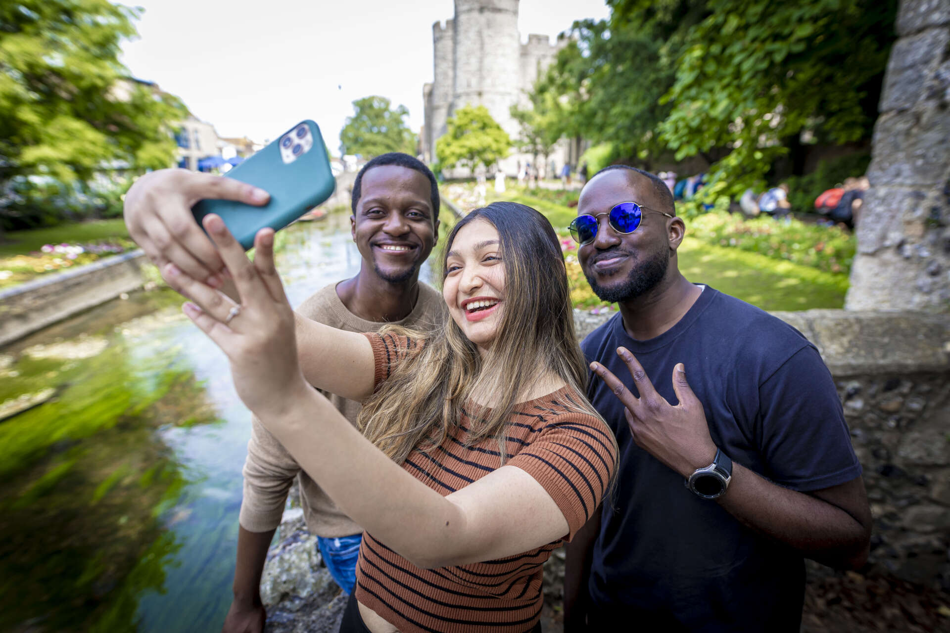 A group of people taking a selfie