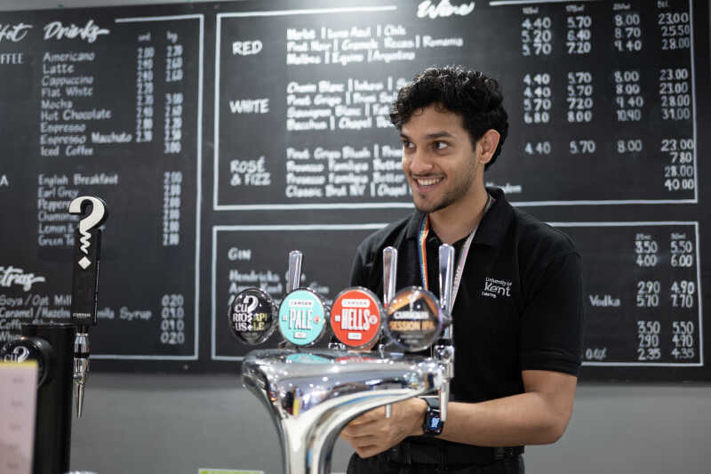 Gulbenkian Cafe with bar staff smiling