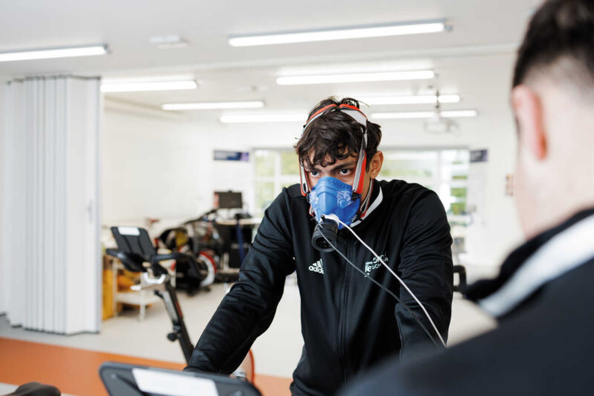 A student carrying out a breathing test