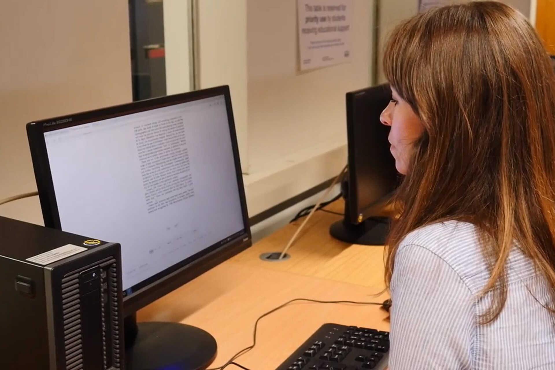 Mature student Kate works on a computer at the University of Kent