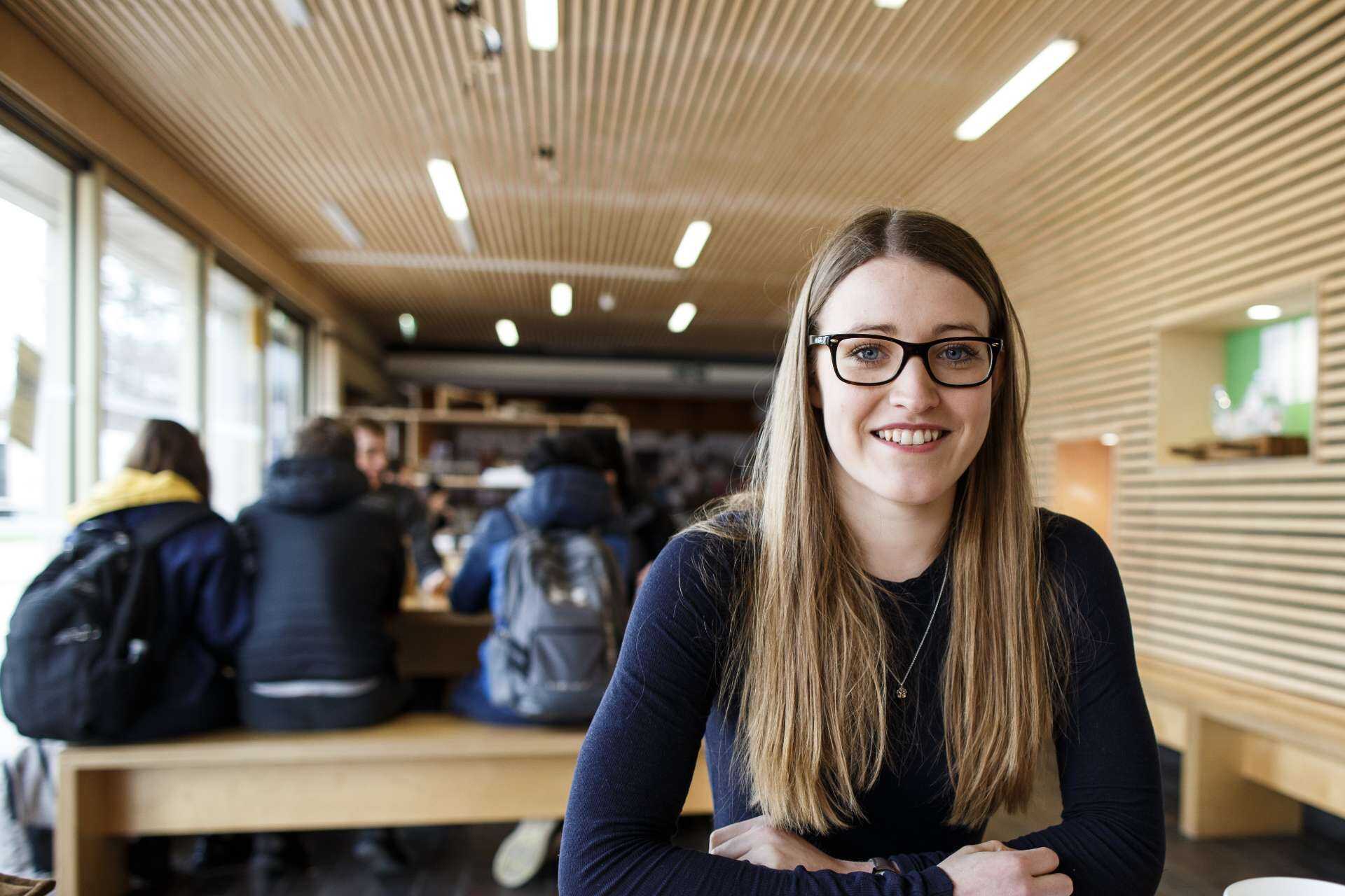 Charlotte Brown in a cafe on the University of Kent campus.