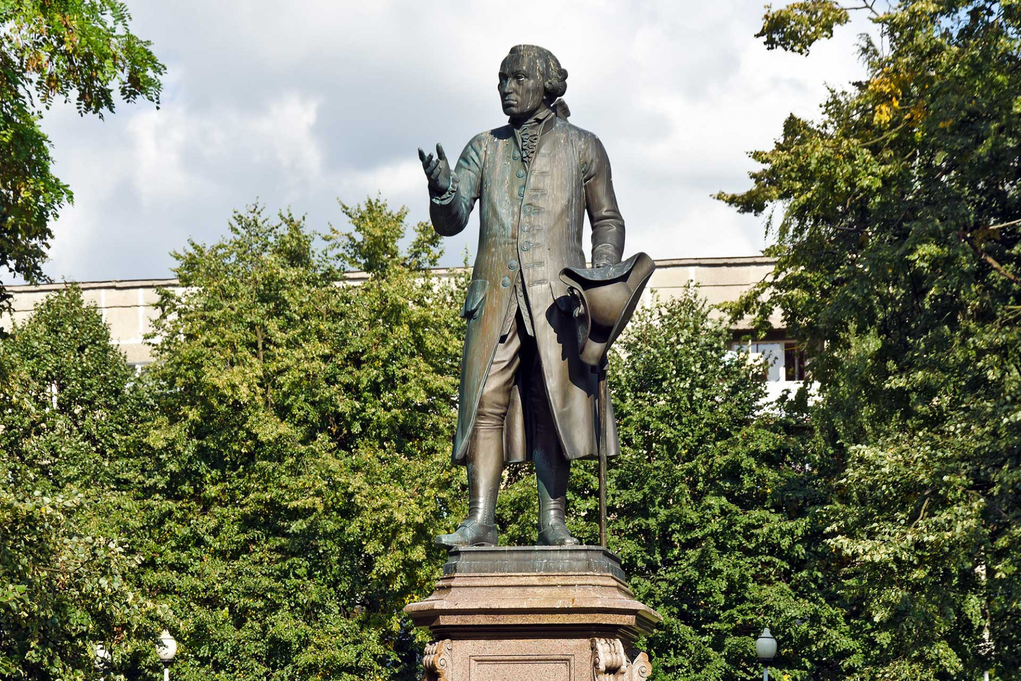 Statue of Kant, against a background of trees