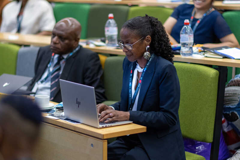 Image shows people in a lecture theatre