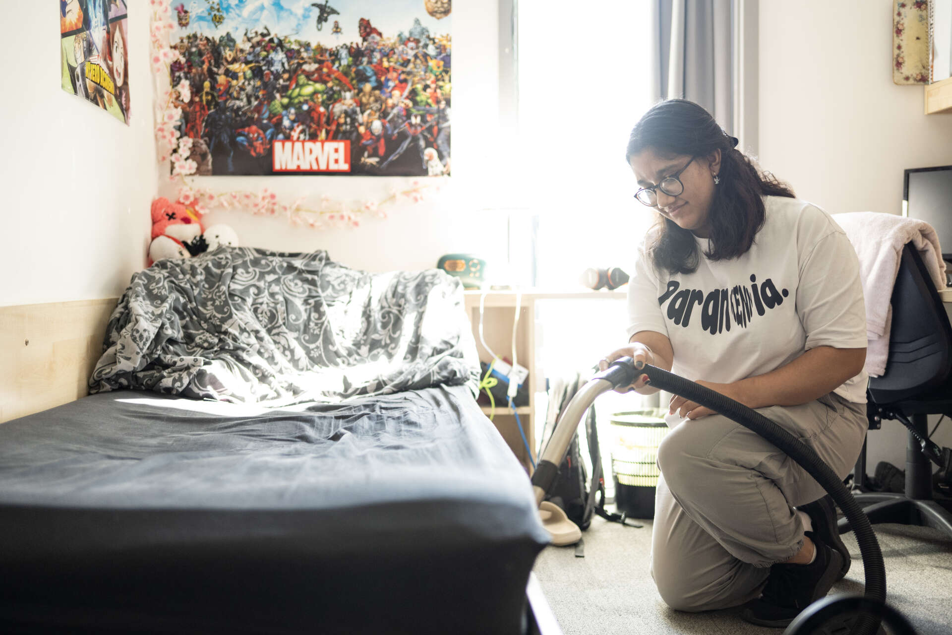 Female student using the vacuum