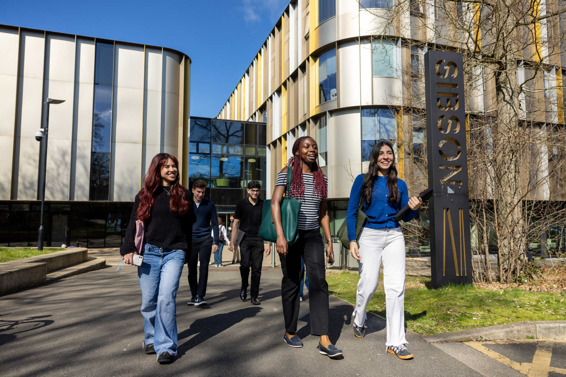 University of Kent Economics students walking outside the Sibson building at our Canterbury campus.