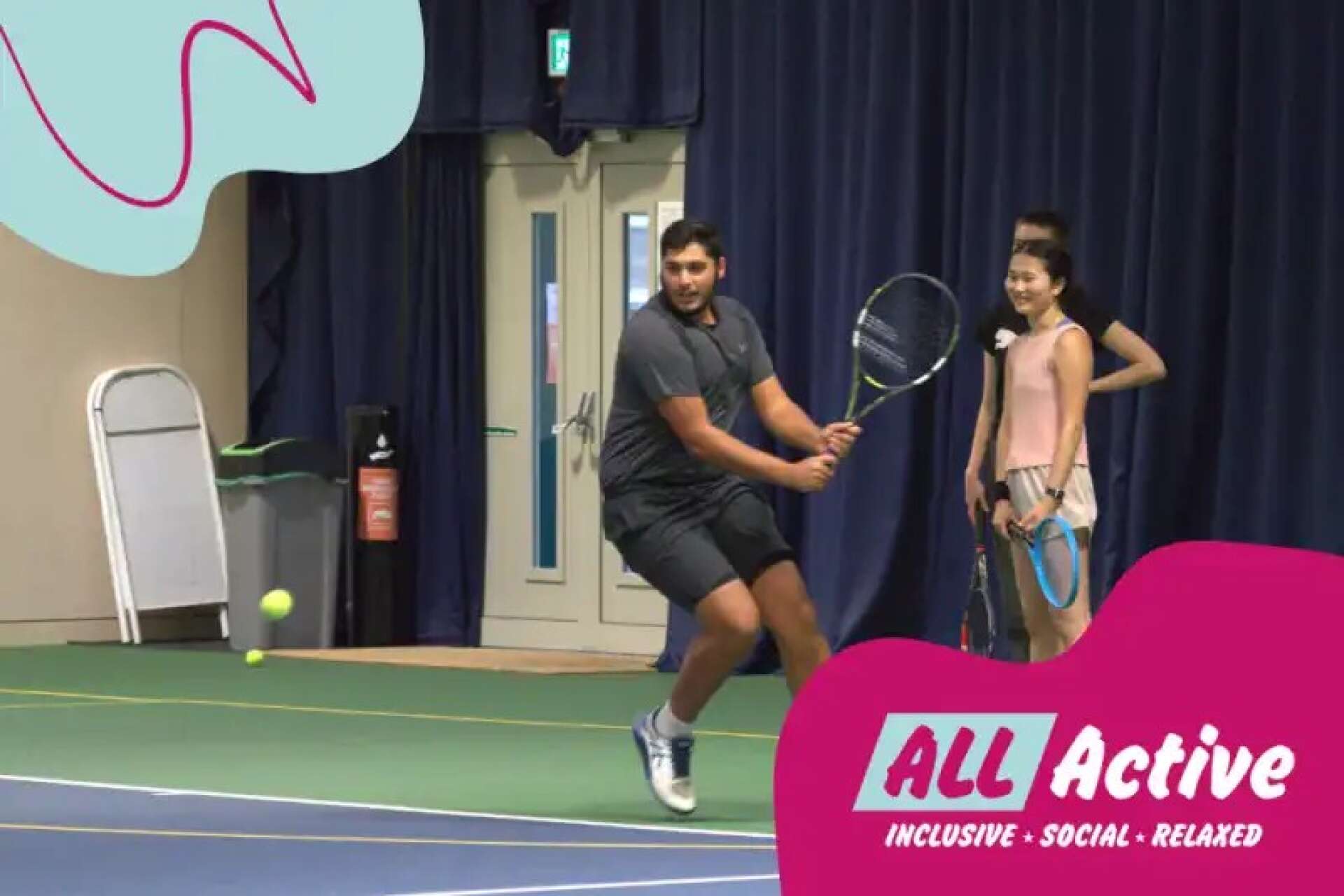 A man swings a tennis racket on an indoor court while others watch. An "ALL Active" logo sits in the bottom corner.