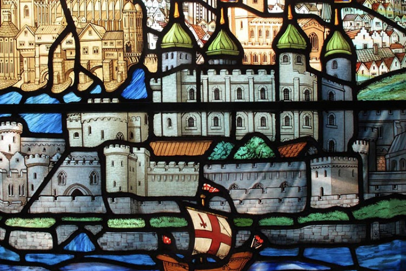 Detail of stained glass panel showing medieval London with Tower of London in foreground