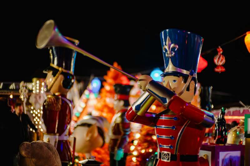 A toy solider Nutcracker playing a ceremonial trumpet