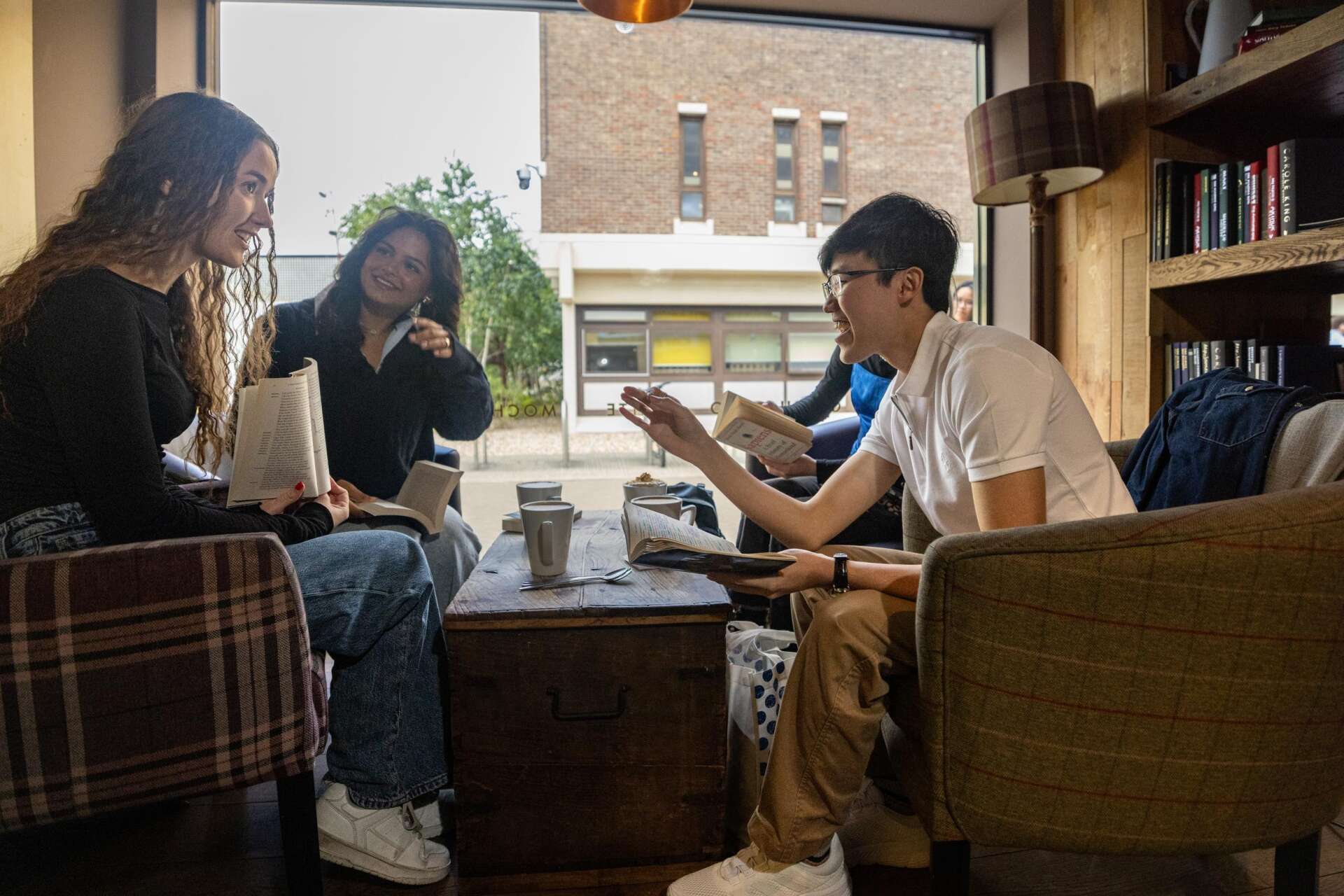 Students having coffee together in Caffe Nero on campus
