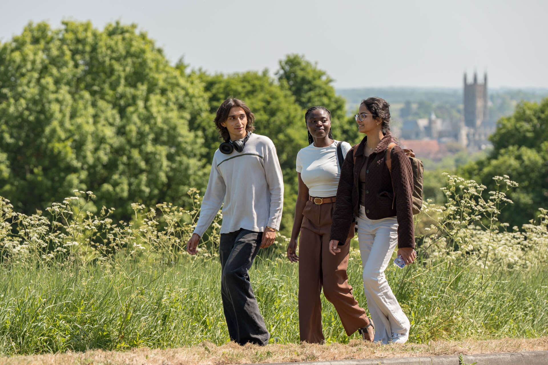 Students walking at Canterbury campus with Cathedral in background