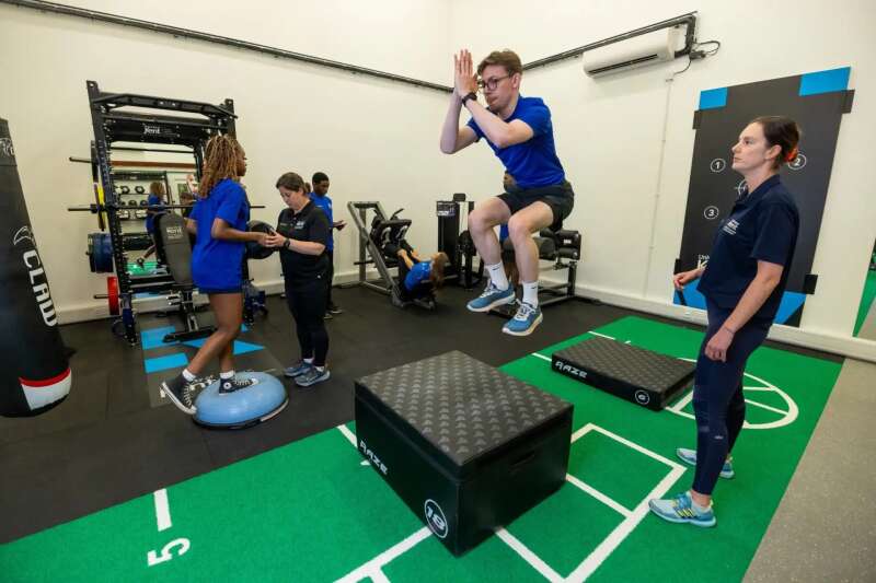 Sport students working in a gym