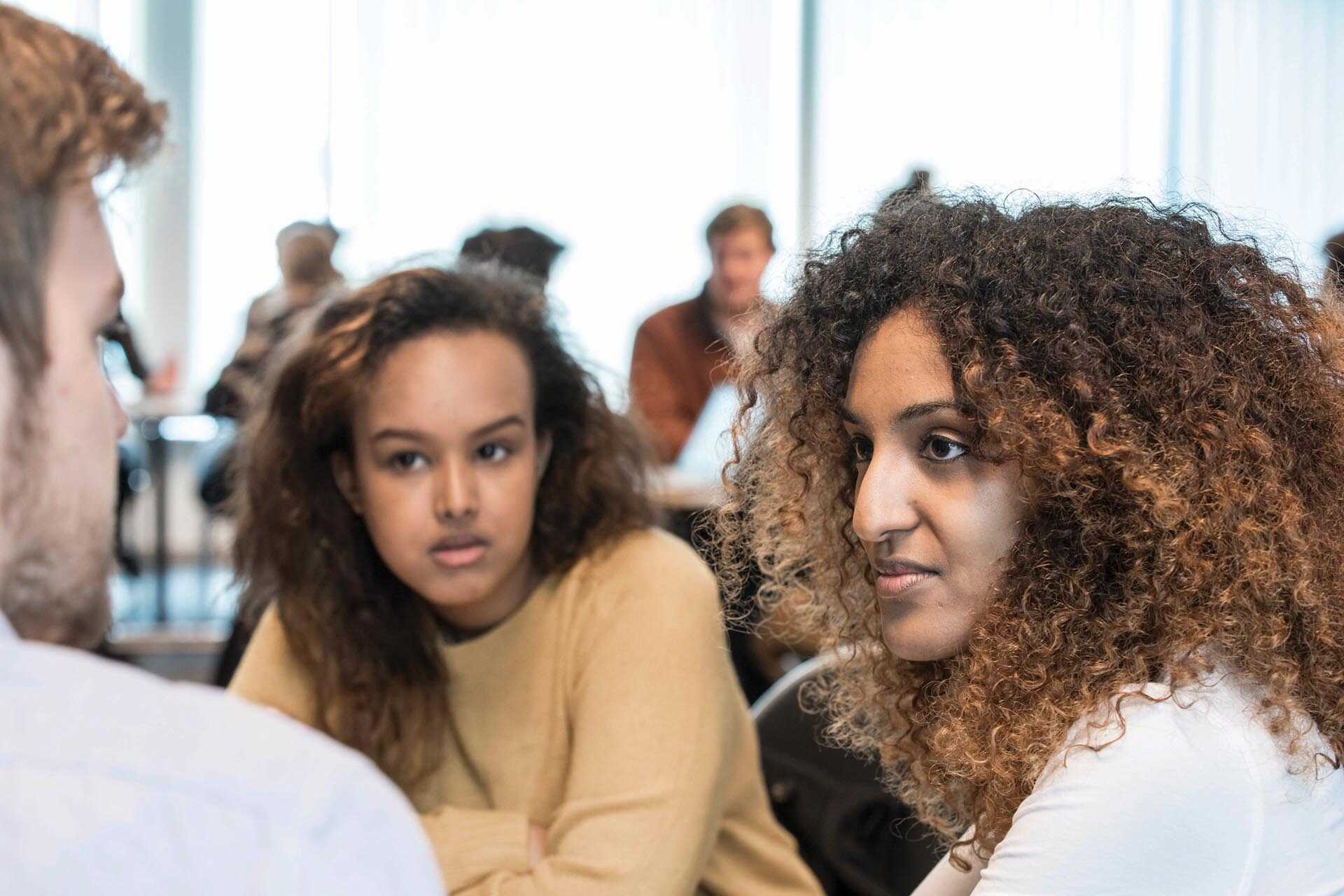 Students chatting in a Brussels classroom