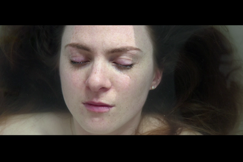 Still image of female in bath from The Cracks short film