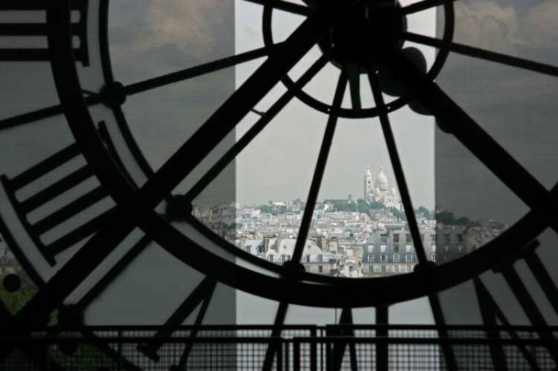 View of Paris from behind a clock in the Musée d'Orsay
