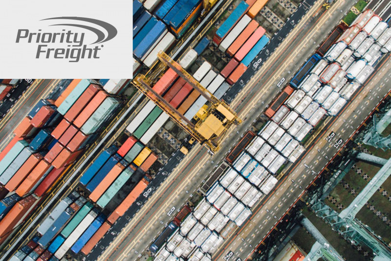 Overhead view of freight loading dock with Priority Freight logo