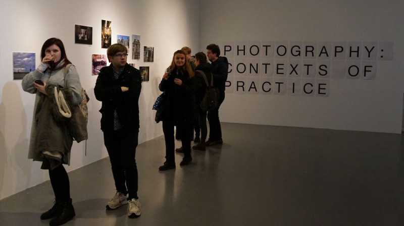 Students looking around a photography exhibition