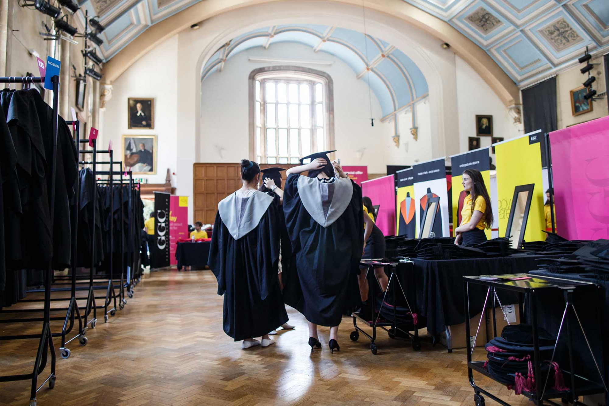 A group of students collecting their gowns in Shirley Hall